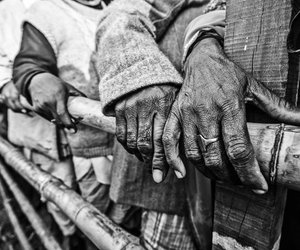 Lost people standing in line to give their information to volunteers