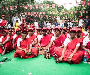 At the end of the rally, workers listening to speeches by union leaders on the Parliament Street.