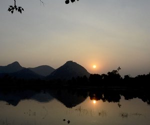 a view of the hills during sunset