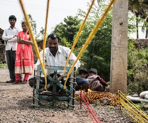 The iron machine, which twists together the multi-coloured rope strands