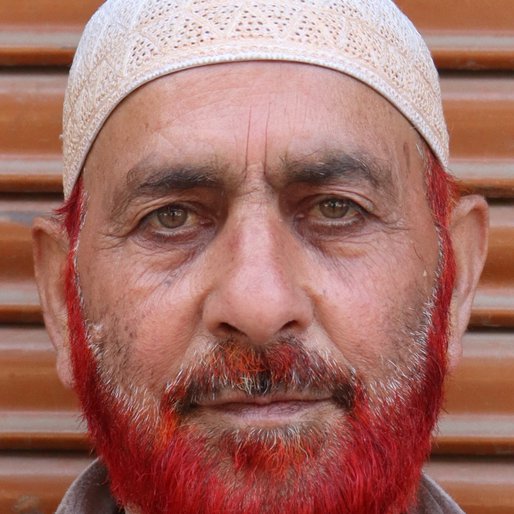 Haji Ghulam Malik is a Coppersmith, also sells utensils in his shop from Arwah, Beerwah, Badgam, Jammu and Kashmir