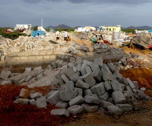 Vijayanagar colony after it has been demolished-
 The demolition crews entered at 5 a.m. and then razed half of the houses there 