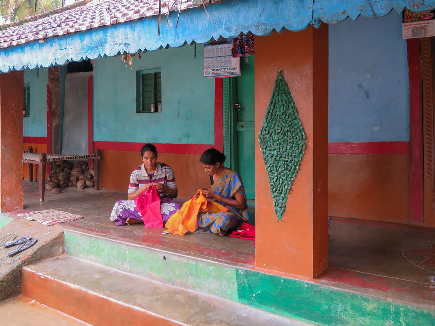 Two women stitching