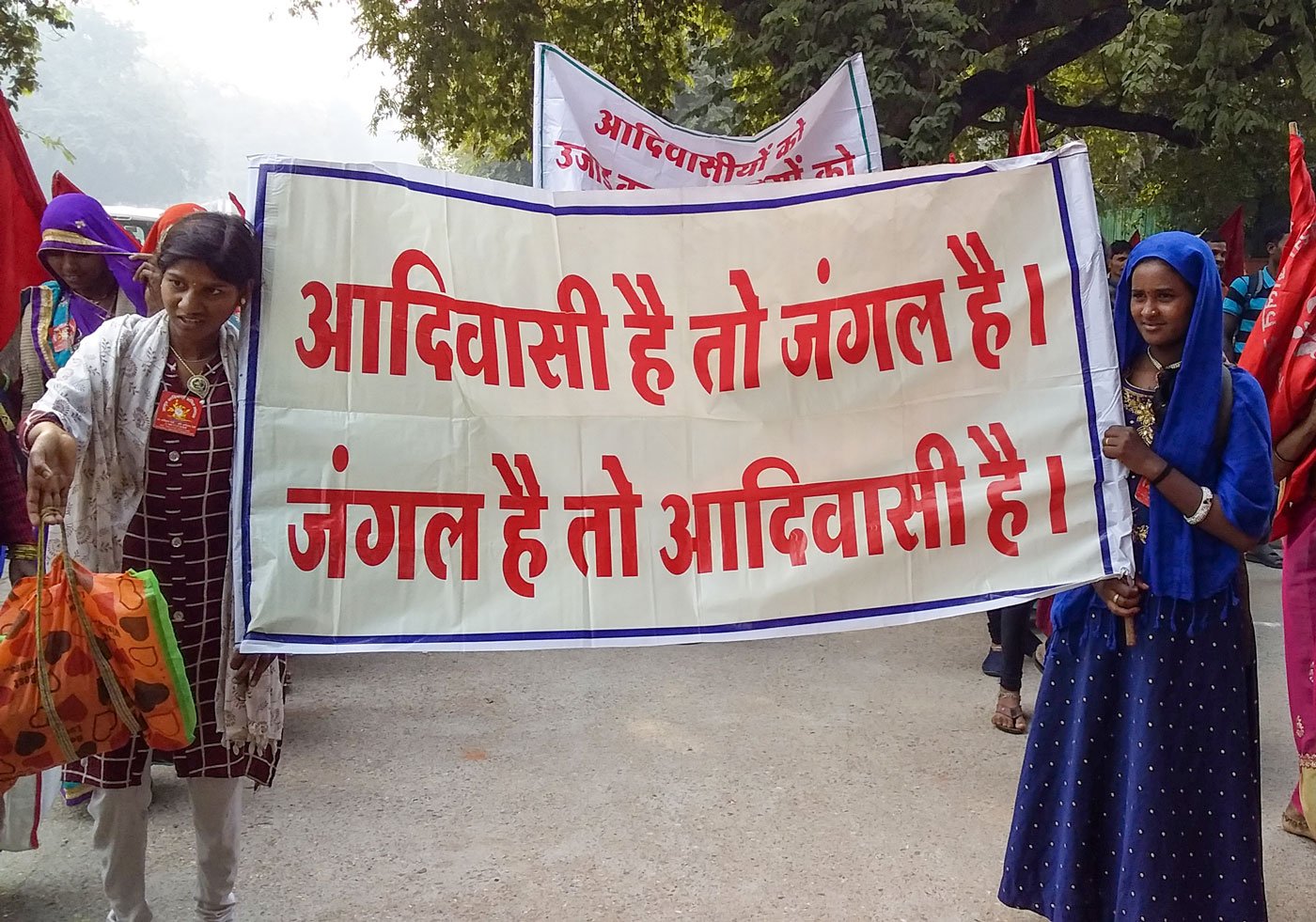 Members of the Jagrit Adivasi Dalit Sangathan on their way to Parliament Street