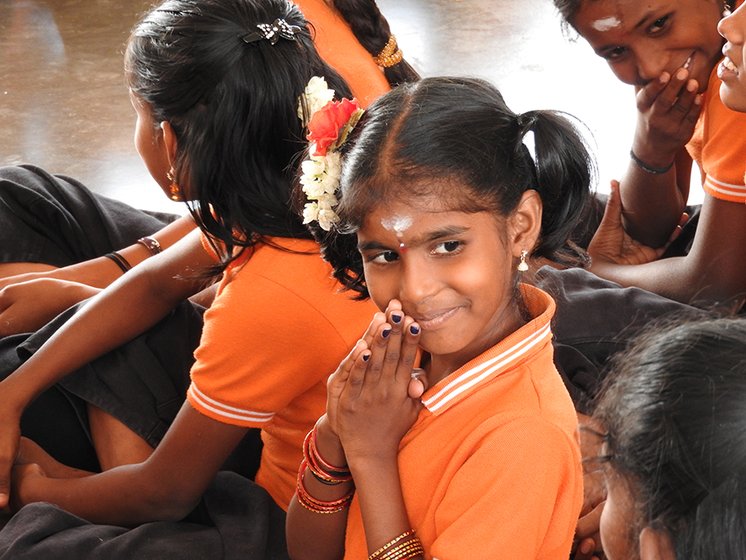 Students on the day of Dussehra. Right: A game of kho-kho on a Saturday afternoon