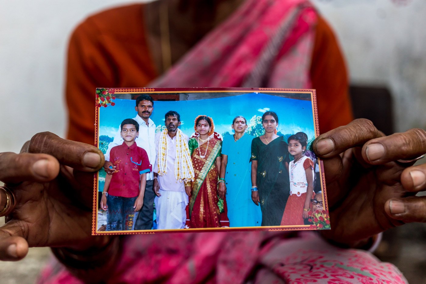 Grandmother sharing an image of his late son and his family