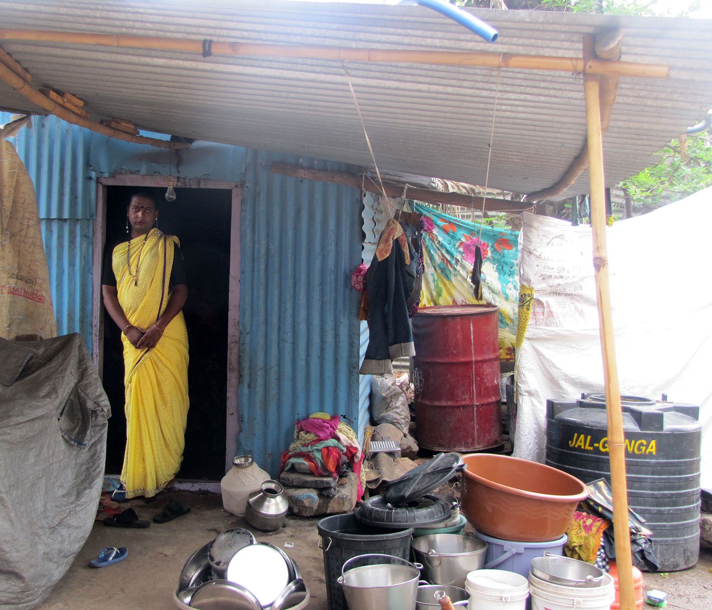 Radhika Gosavi in the yard outside her home