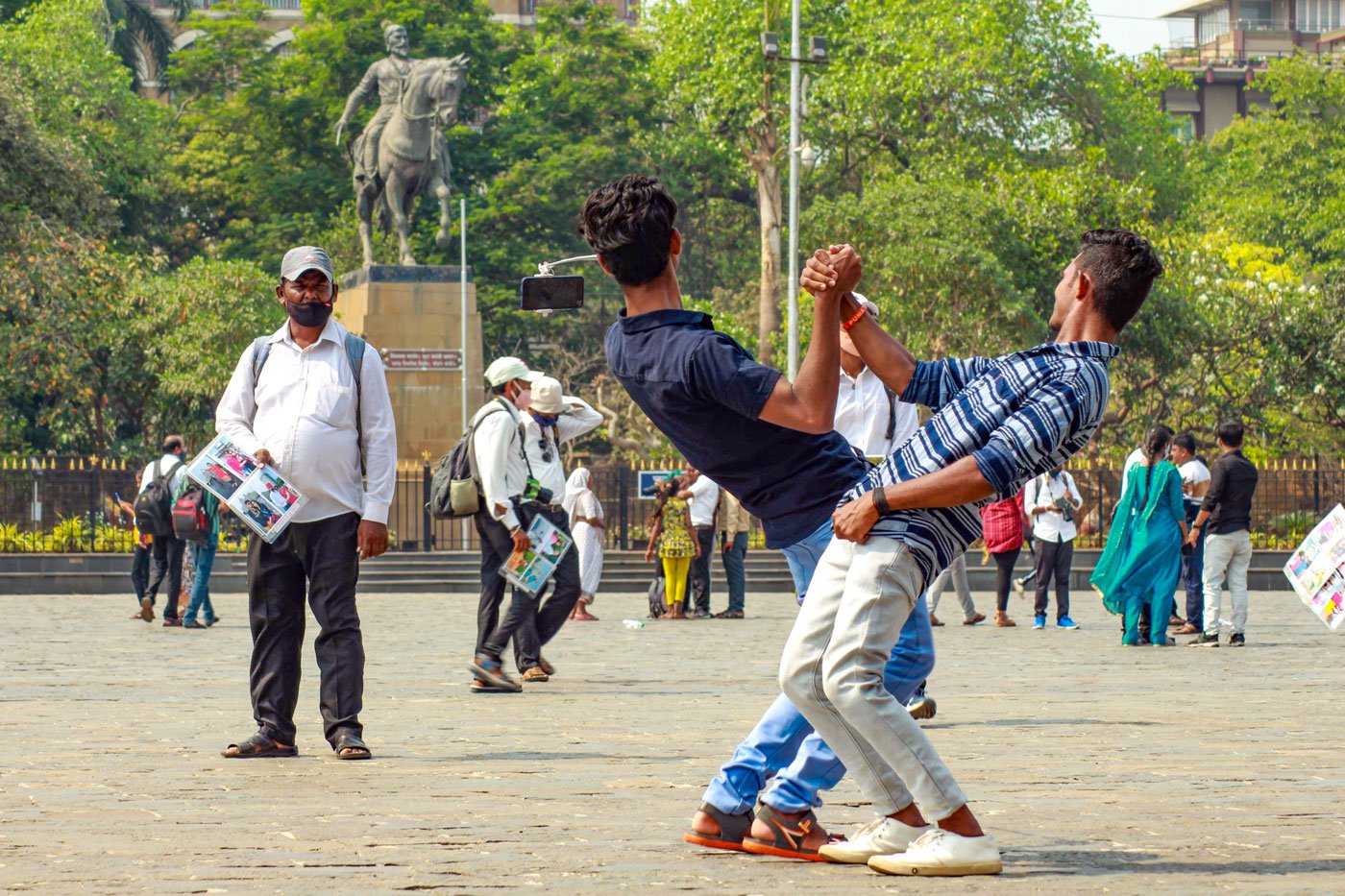 Many photographers who have for decades created images and memories for visitors at this popular Mumbai monument have been shuttered out – first by the spread of selfies, and now due to the lockdowns