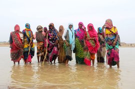 Footprints of protest in the sands of a mine