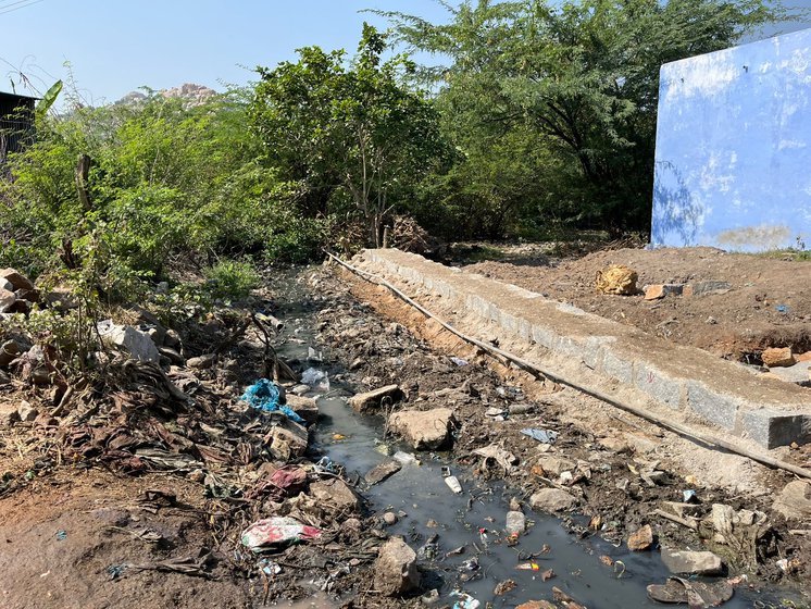 The area where the residents of Gudikal use to defecate (left) and an open sewer (right) in Gudikal’s ward three