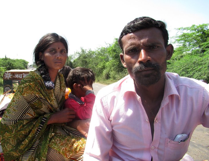 A family travelling on a tractor