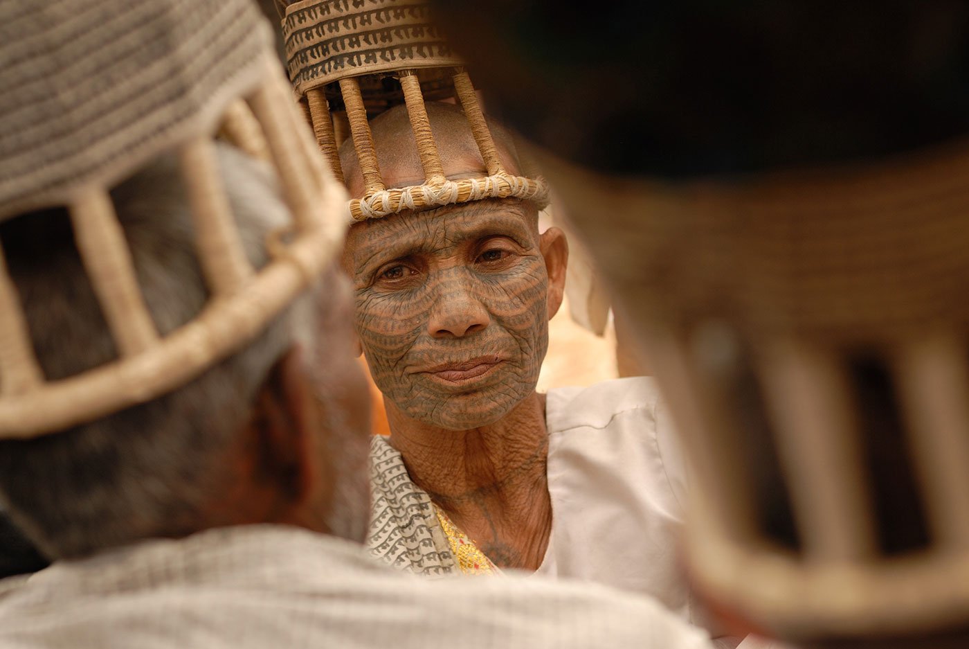 Woman with 'Ram' tattooes on her face