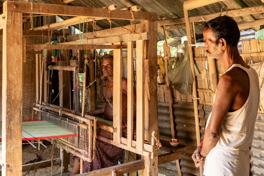 Left: Roopchand Debnath (standing behind the loom) is the last handloom weaver in Tripura's Gobindapur village, and only makes gamchas now. Standing with him is Rabindra Debnath, the current president of the local weavers' association.