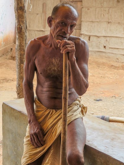 Paddy farmers Dharma Garel (left) and his son Raju: 'The rain has not increased or decreased, it is more uneven – and the heat has increased a lot'

