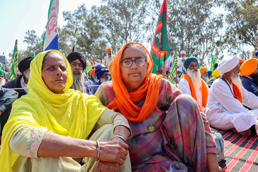 Left: Neighbours and friends, Gurmeet Kaur (yellow dupatta) and Charanjit Kaur have come to Shambhu border from Khurana village in Punjab's Sangrur district.