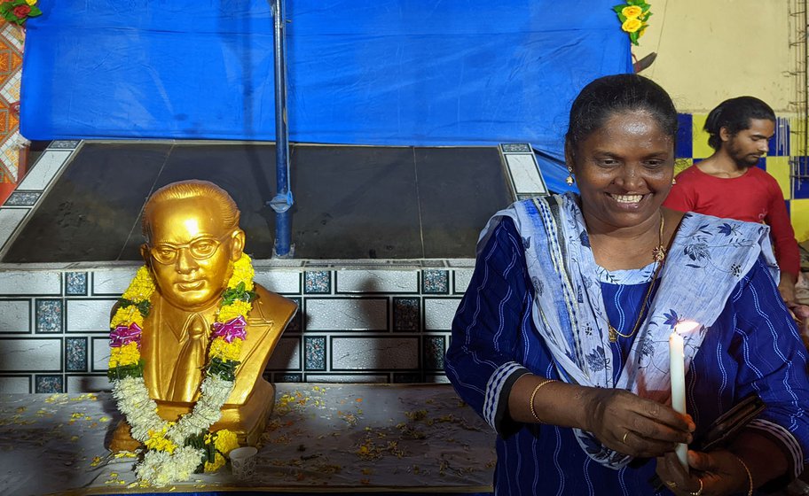 Left: Candles are lit before the beginning of the rally and people gather and talk about the contributions of Ambedkar.