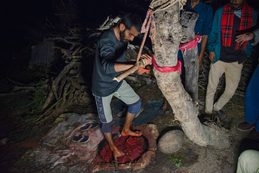 Talab Hussain (left) stomping on a traditional woollen blanket in Samba district of Jammu