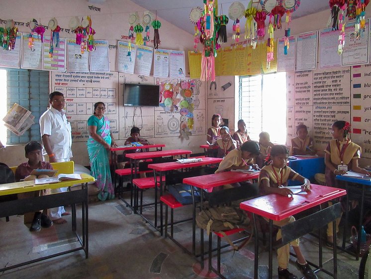 Rajabhau Gire (left) and Sheela Kulkarni at ZP school of Sanja