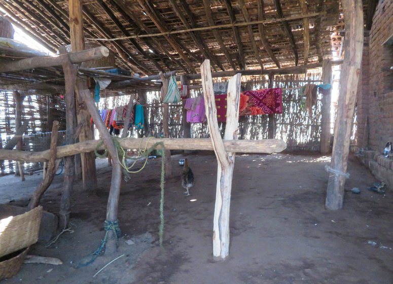 From Kumbhar hamlet, the nearest vaccination centre is 20 kilometres away. 'We have to walk. No other option', says Pesri, who sold all the family's animals for her husband's cancer treatment (the wooden poles they were tied to are on the right)