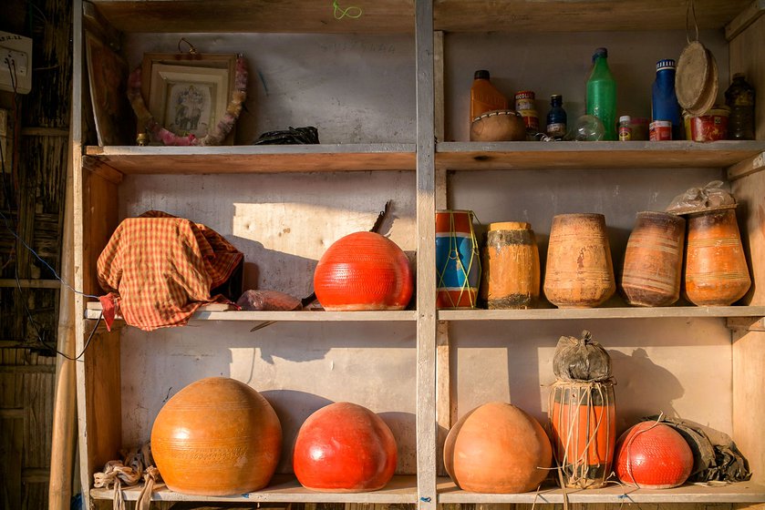 Right: Negeras and small dhols that have come in for repairs line the shelves