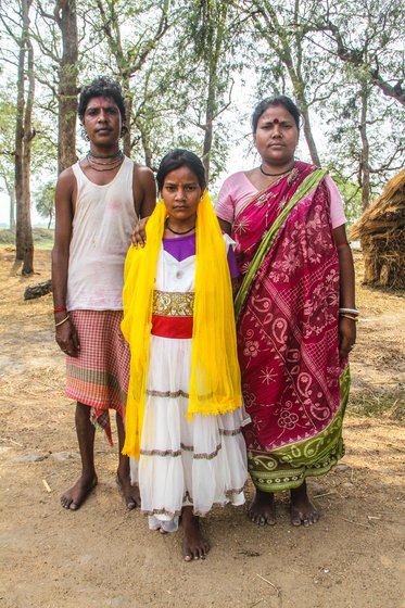 Raju posing with his family