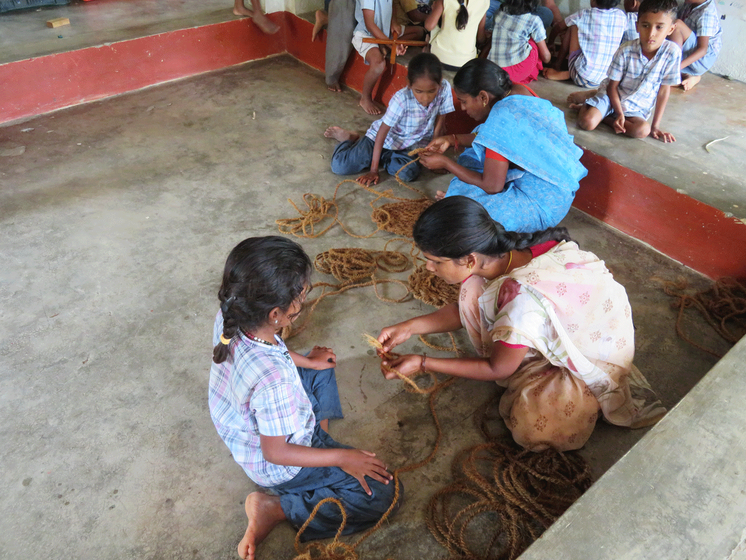 Teachers and students working at an after-school training centre