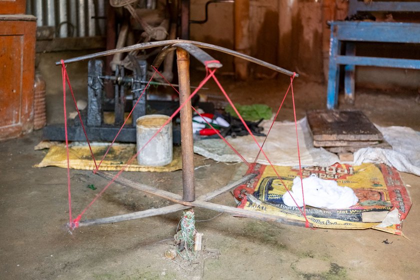 Left: Spool winding wheels made of bamboo are used for skeining, the process of winding thread on a rotating reel to form a skein of uniform thickness. This process is usually performed by Basana Debnath, Roopchand's wife.