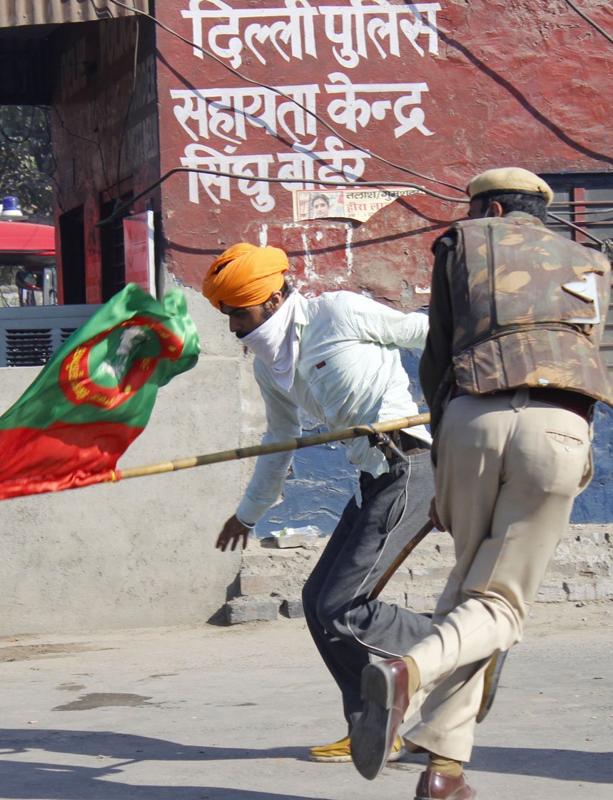 November 27: 'When protestors block a road or damage it, they are branded as criminals. What if governments do the same? Are they not what they call us?' asks 70-year-old Harinder Singh Lakha (not in these photos) from Punjab's Mehna village

