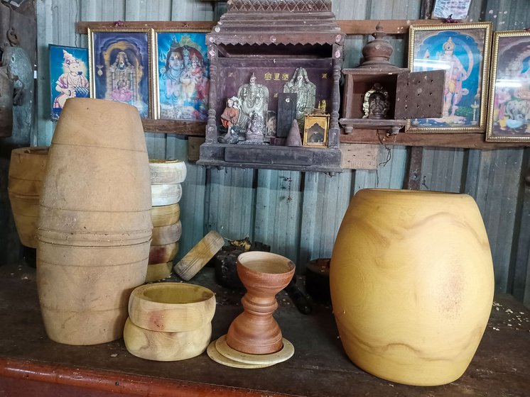 Right: Different musical instruments made by Kuppusami Asari from jackfruit wood, including mridangam, tavil, kanjira and udukkai