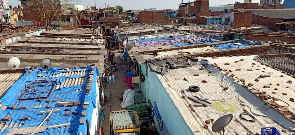 Around 120 families live in Citizen Nagar, a relief colony for 2002 riot victims at the foothills of the Pirana landfill in Ahmedabad

