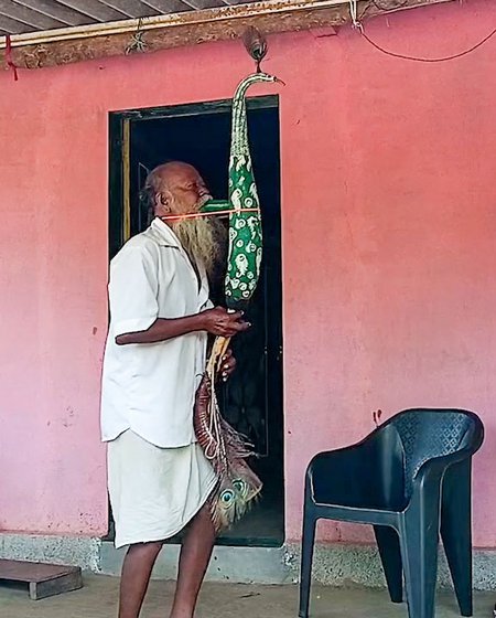 Right: He says, ' Tarpa is just like a family. There is a male and a female. When I blow some air, they unite and the sound that you get is magical. Like a stone, it is lifeless. But with my breath it comes alive and produces a sound, a musical note’