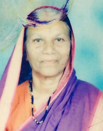 The late Jai Sakhale (left) and her daughter, Lilabai Shinde, with her mother's photo 

