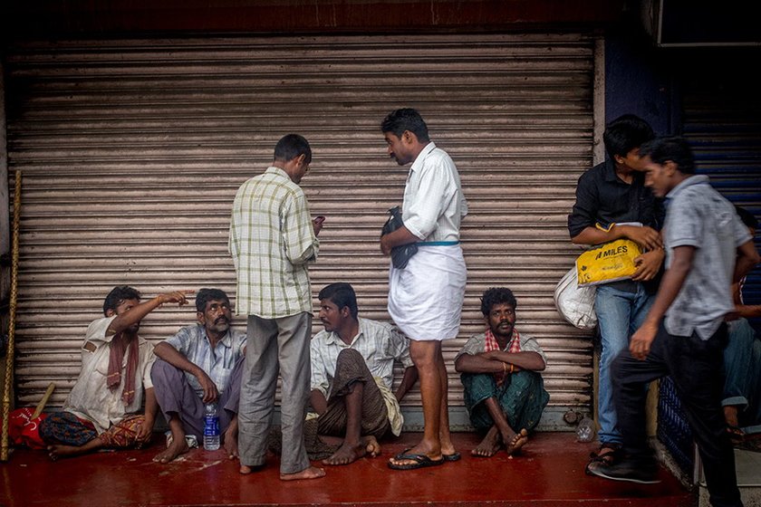 In search of a fortune: labourers from Anantapur buying lottery tickets