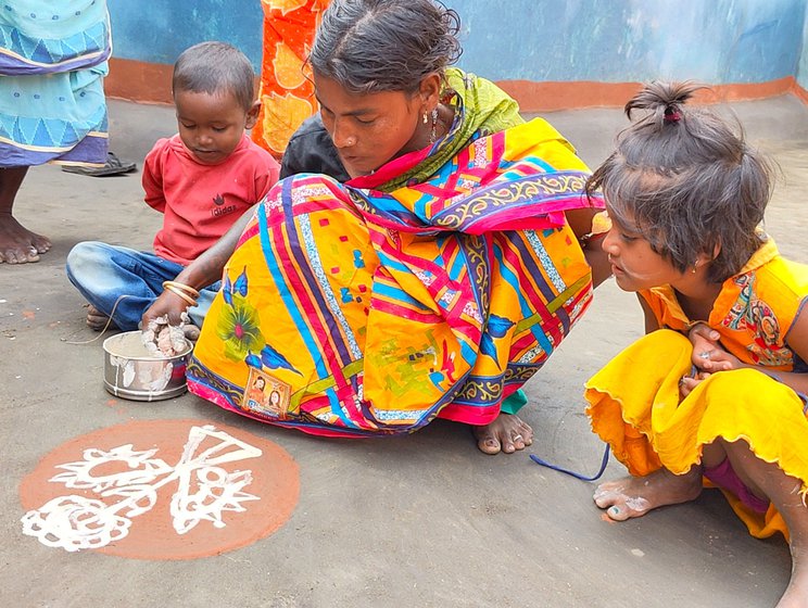 Residents decorate their homes (left) during the Bandna festival in Sarpukurdanga.