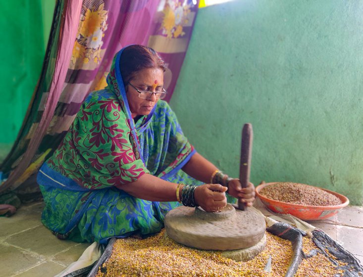 Mandakini (left) and Kalyani Salunkhe make puran polis for the devotees. The temple's closure gives them a break but it has ruined the family income