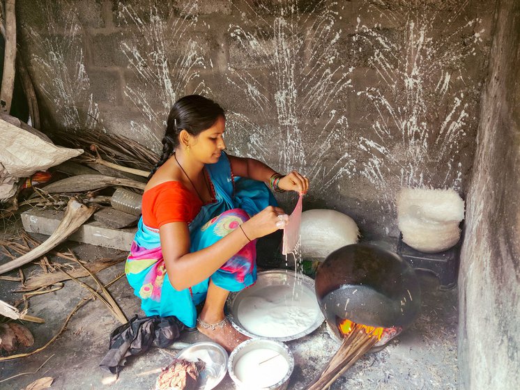 Veteran sweet maker, Vijaya has been making reku since 2019 and she says she always has to give it her full concentration. When she dips the cloth in the rice batter and lays it on the pot, a  film forms on the inverted pot (right)