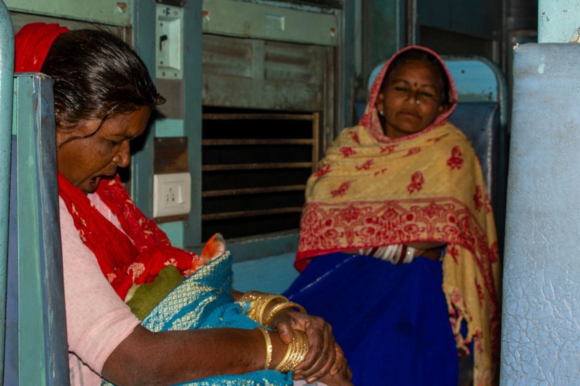 Left: Saranga (left) and Karuna (right) on a train from Maninagar to Nadiad.