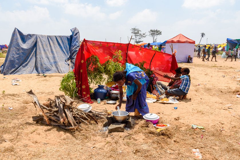 People taking firewood and stalks of branches (left) to build their temporary homes, and to cook food (right)