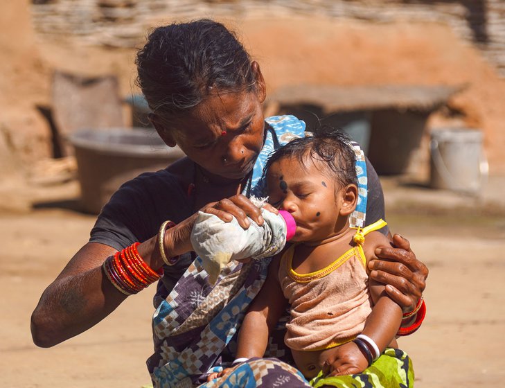 Tulsa's mother Padmini (holding the baby)