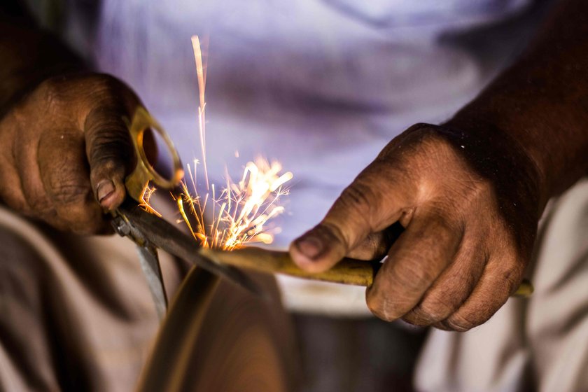 Dilawar also makes and sharpens tools other than adkittas. 'This side business helps us feed our family', he says

