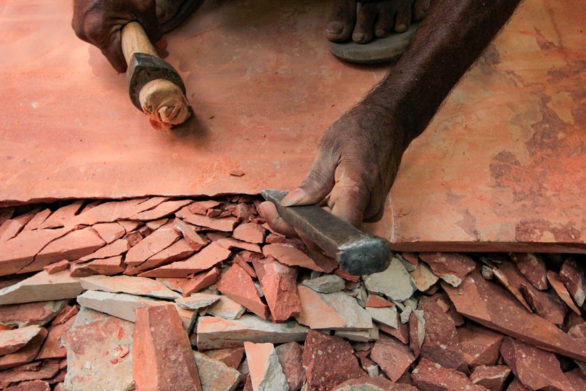 Nandkishore, an expert in cutting stones and shaping them with hammer and chisel, says, 'The graveyard has never seen such a horrible situation as it does now'