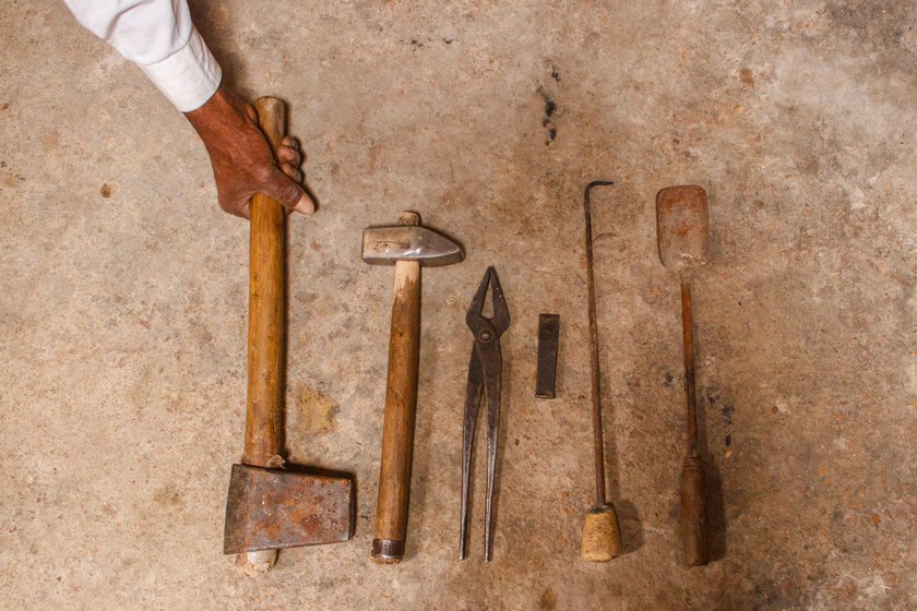 Some of the tools Mohanlal uses to make a morchang: ( from left to right) ghan, hathoda, sandasi, chini, loriya, and khurpi . 'It is tough to make a morchang ,' says the 65-year-old and adds that he can’t recall how many morchangs he’s made to date: ' g inti se bahar hain woh [there is no count to it]'