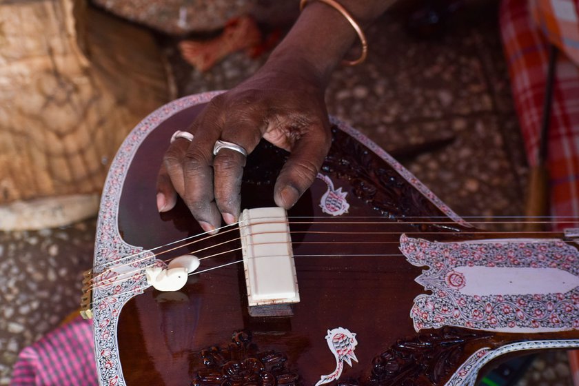 Right: Japanese steel strings sourced from Mumbai are set on a camel bone clog. These bones are acquired from factories in Uttar Pradesh