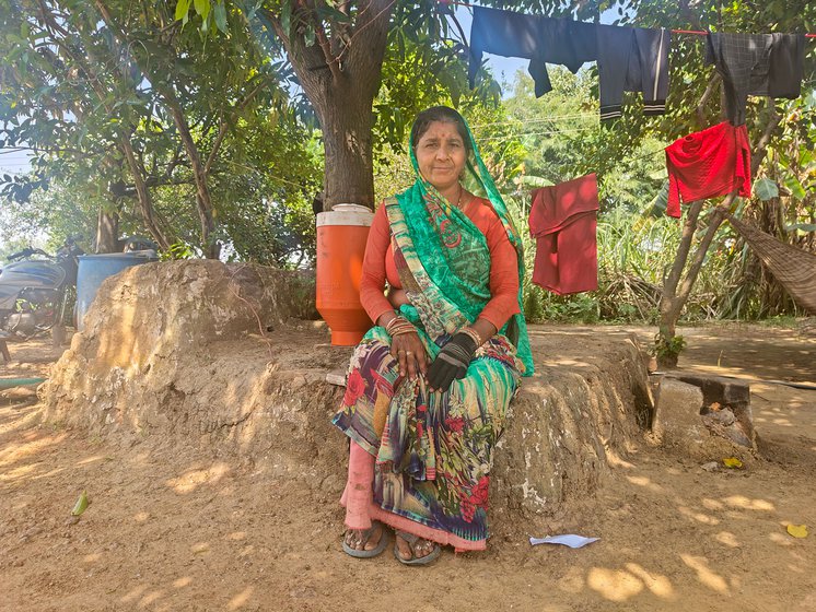 Left: Ramkumari with her grandchild in their house in Khorghar and (right) outside her home. Her son Hemant was a victim of the fraud. While they did not suffer financial losses, the rumour mills in the village claimed they had declared Hemant dead on purpose to receive the compensation. ' I was disturbed by this gossip,' says Ramkumari, 'I can’t even think of doing that to my own son'