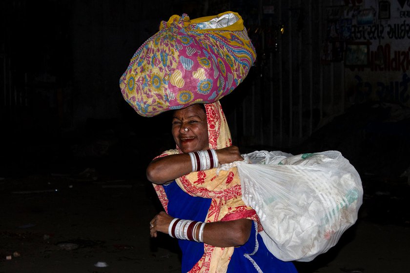 Right: Karuna hauls up the bundles of rope she hopes to sell the following day