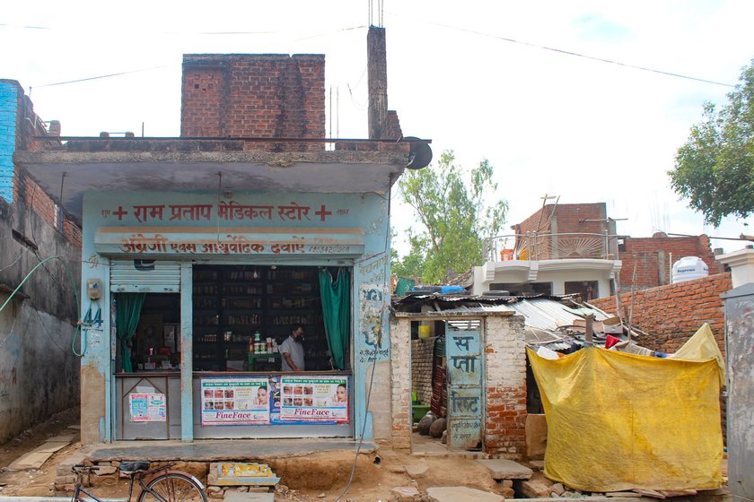 The Shivaji Inter College (let) in Chitara Gokulpur village, where Ankita and Chhoti study, is shut, cutting off their access to free sanitary napkins; these are available at a pharmacy (right) three kilometers from their house, but are unaffordable for the family

