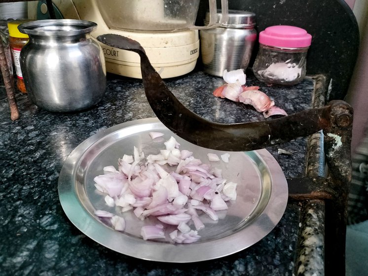 For elderly women who can't sit on the floor, Rajesh has designed a compact morli that be attached to the kitchen platform (right)