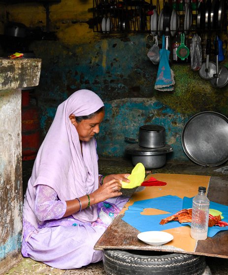 In Khambhat, Kausar Banu Saleembhai gets ready to paste the cut-outs