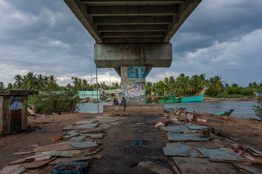 Left: Maneesha waits with other women for the fish auction to begin. Right: All sellers leave the bridge around 5 p.m.