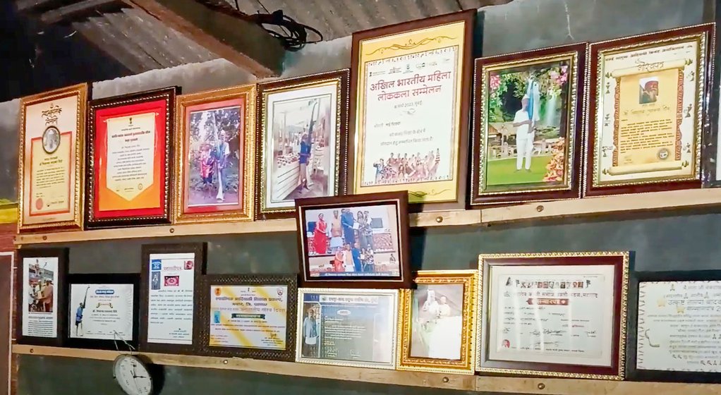 Right: He has won many accolades for his tarpa playing. In 2022, he received the prestigious Sangit Natak Akademi Award and was felicitated in Delhi. One wall in his two-room house is filled with his awards and certificates